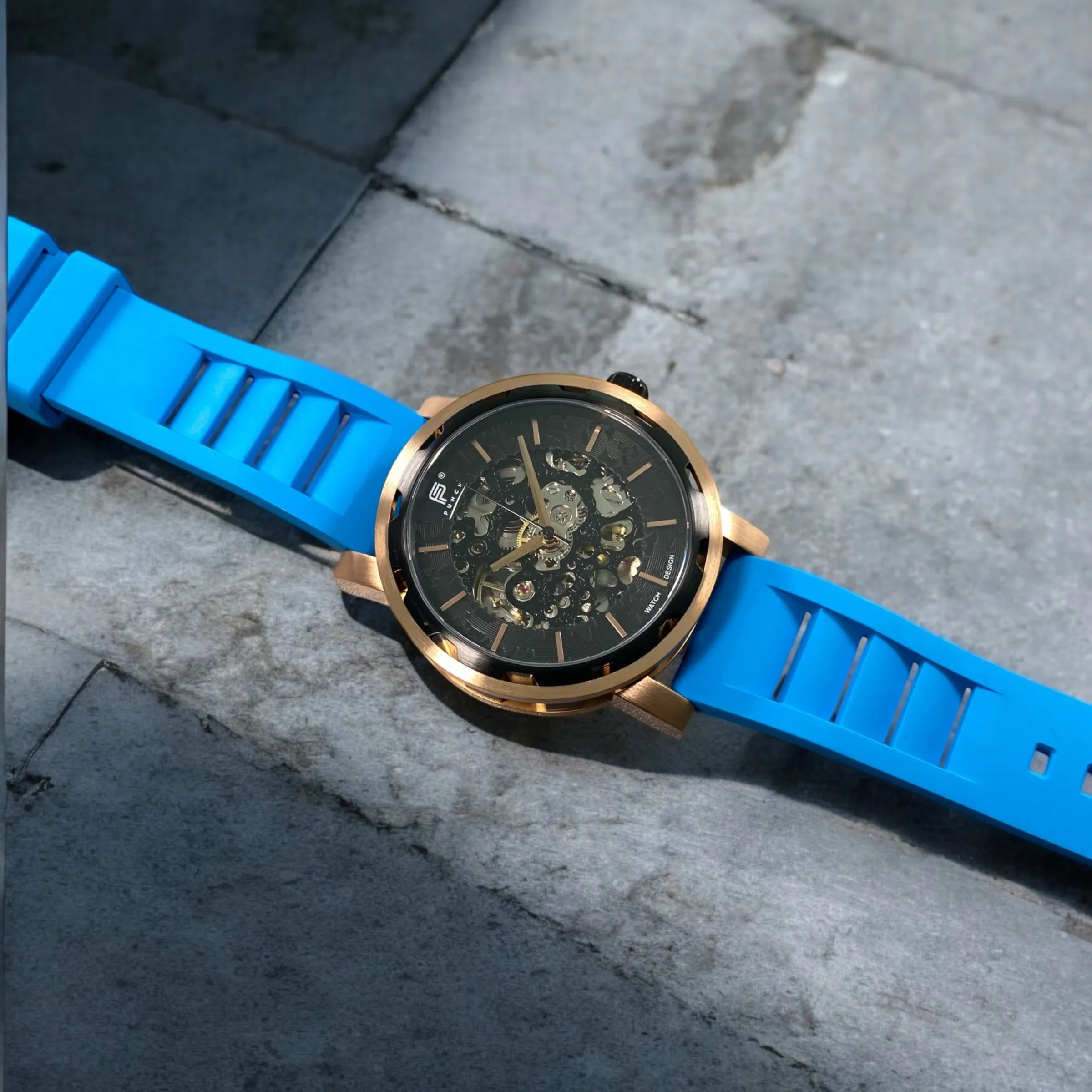 PUNCH Mens Watch, Rose Gold & Black Skeleton Automatic Watch - Blue Rubber Strap