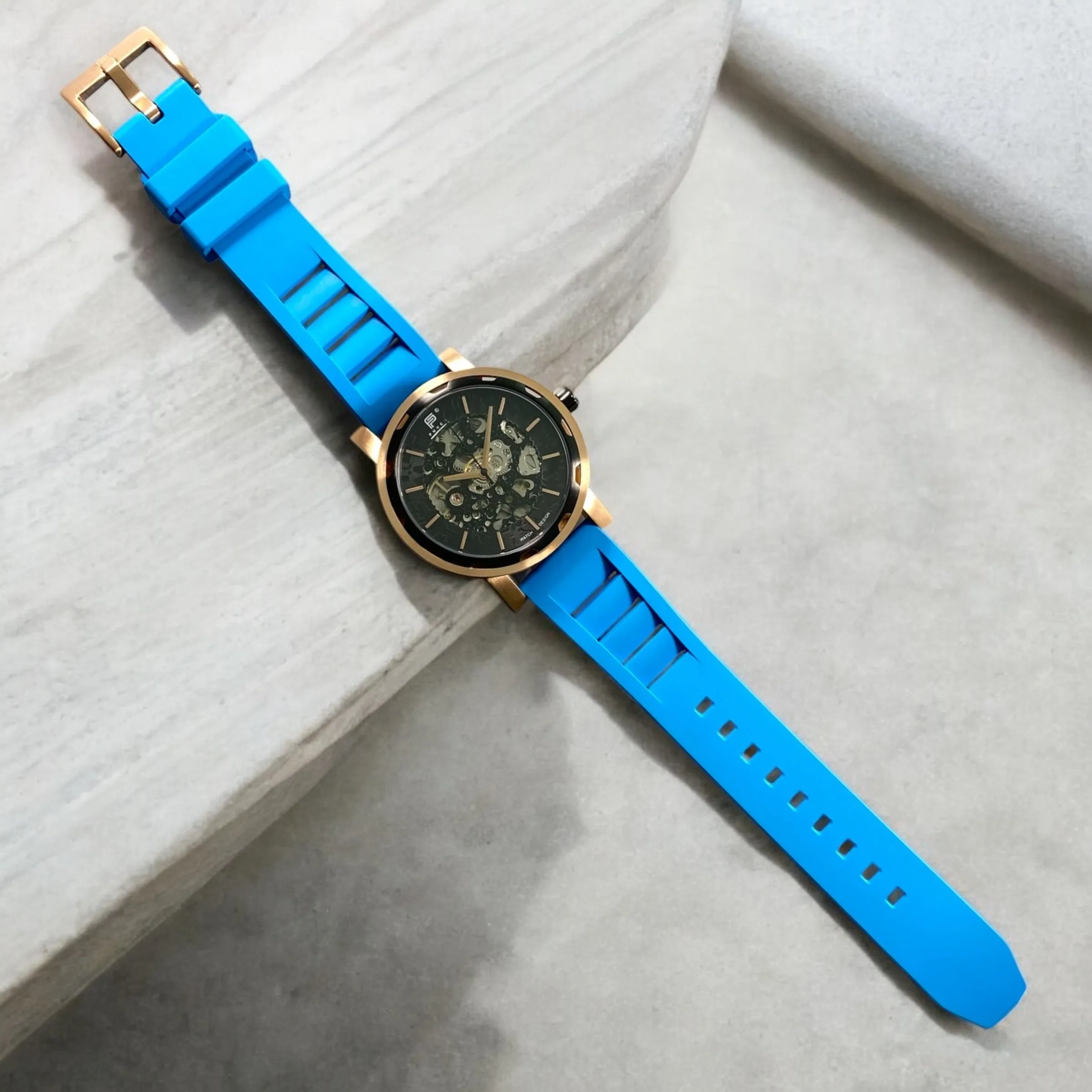 PUNCH Mens Watch, Rose Gold & Black Skeleton Automatic Watch - Blue Rubber Strap